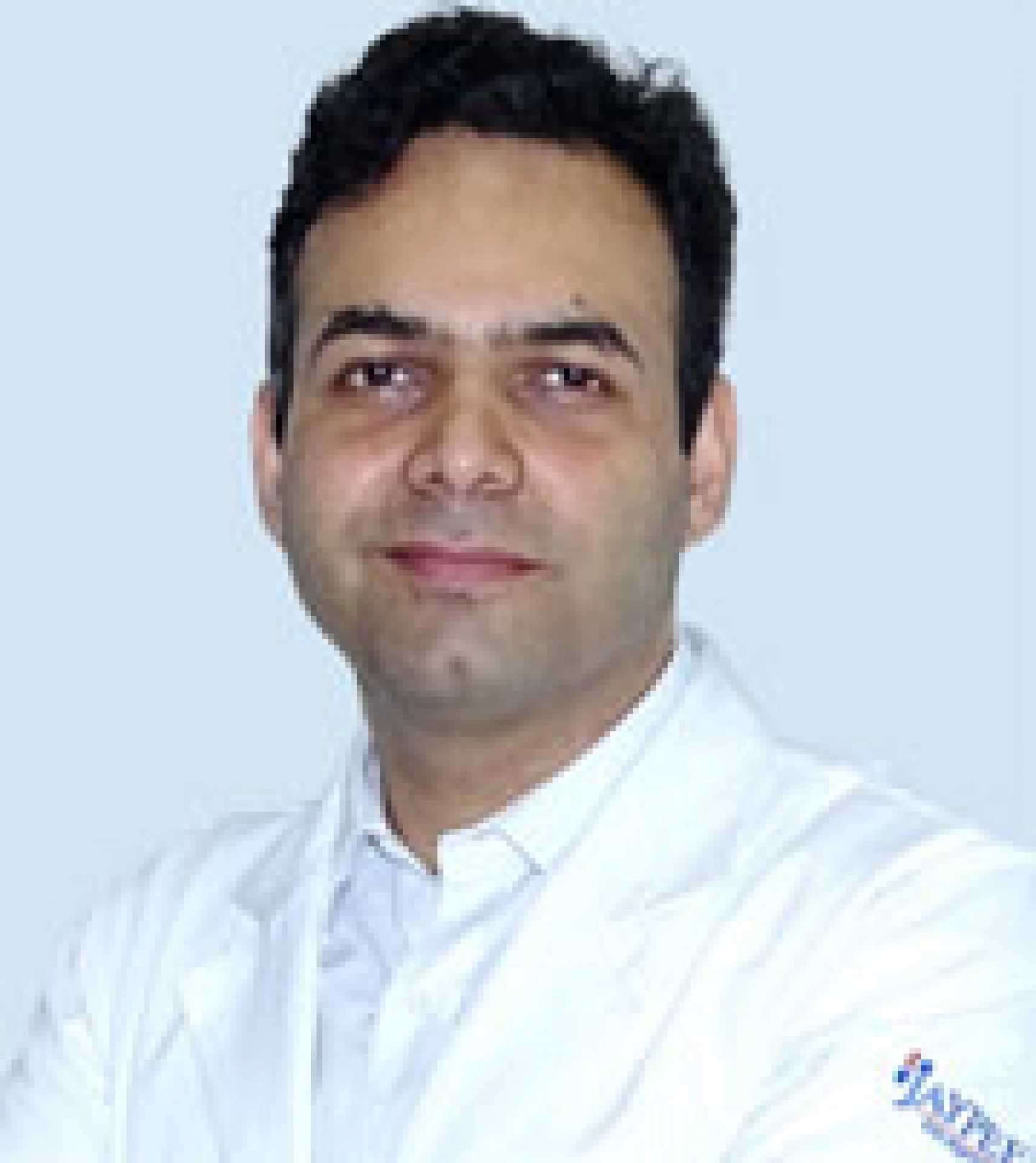 Dr Dinesh Rattnani, [object Object]