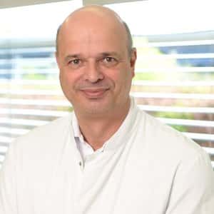 Доктор. Мед. Сорен Юст, [object Object]